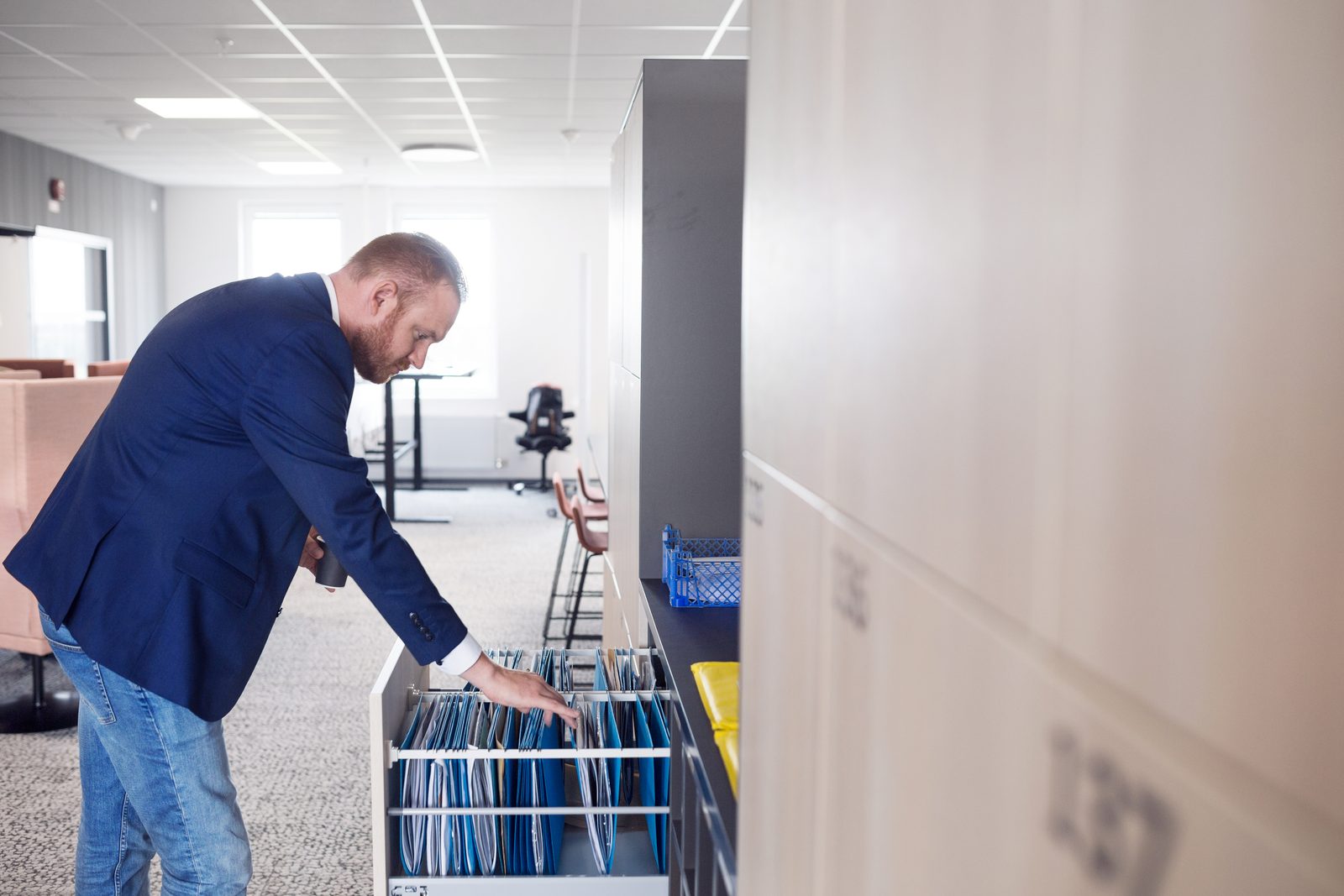 Professional retrieving past project files from an archive